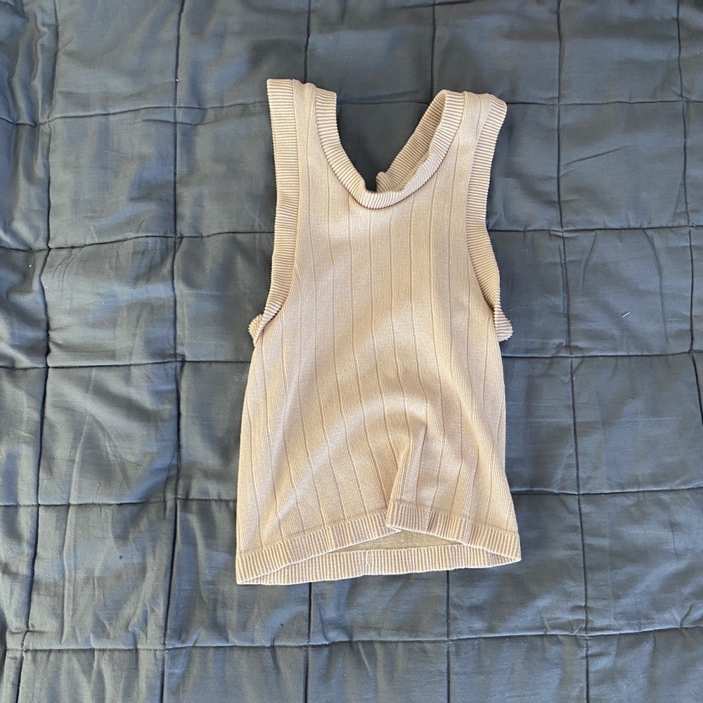 Stretchy tank top, tighter fit. Soft